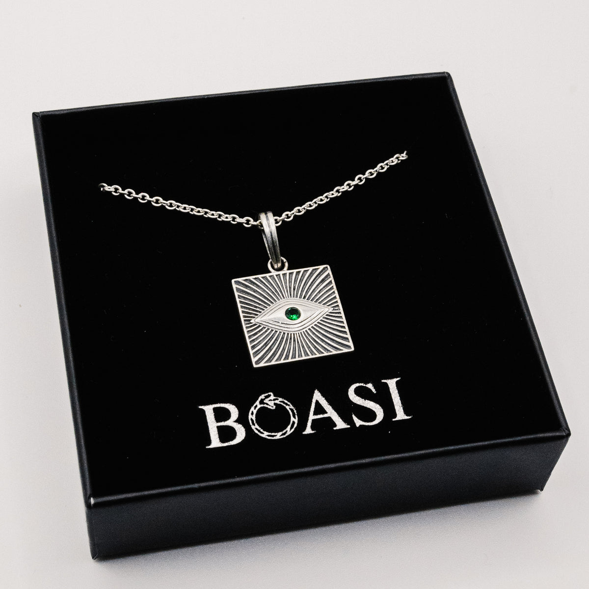 Colgante God's Eye de plata 925 BOASI con zircón verde y cadena